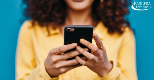 Woman texting on the phone.