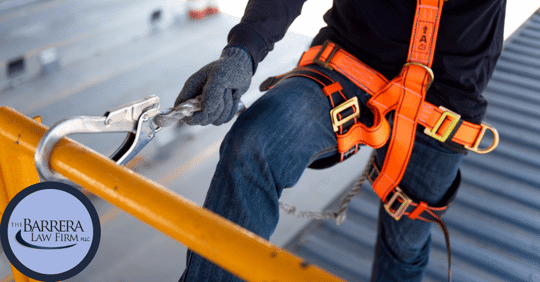 construction worker with harness attached to pole on scaffolding