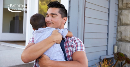 Father hugging their child